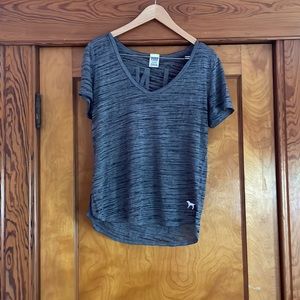 A grey v neck T-shirt.